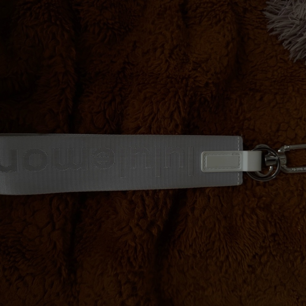 silver lululemon keychain